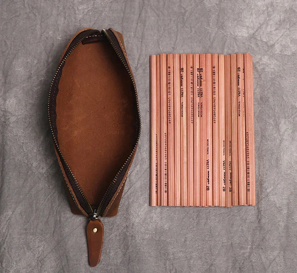 Brown leather makeup pouch with zipper, open top and stitched edging
