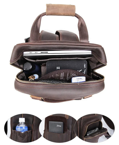 Brown leather camera backpack with top handle and open front zipper, visible camera gear inside