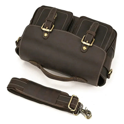 Brown vintage crossbody camera bag with flap, buckles, and detachable shoulder strap