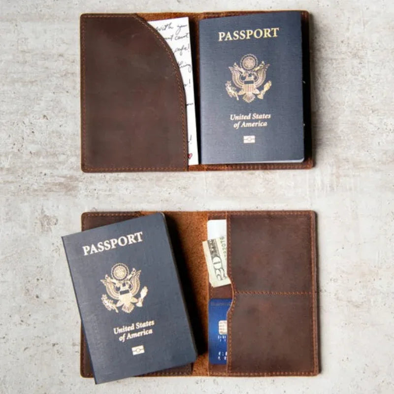 Brown leather passport cover open, showing passport documents and inner pockets.
