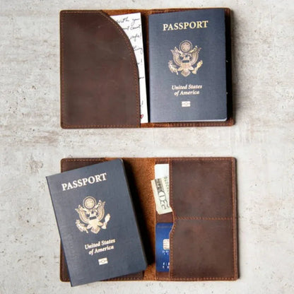 Brown leather passport cover open, showing passport documents and inner pockets.