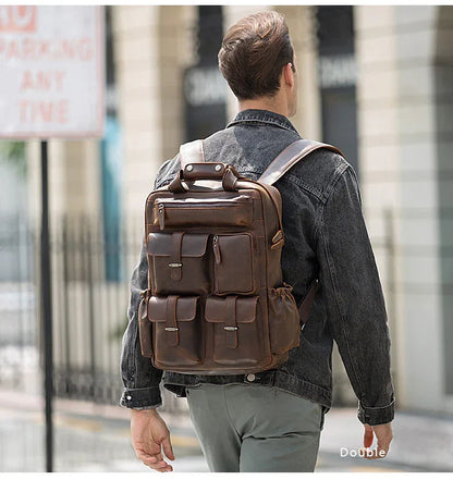 Brown leather backpack worn from behind with shoulder straps and back flap.