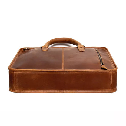 Vintage leather briefcase with structured base, top handles and front seam, brown