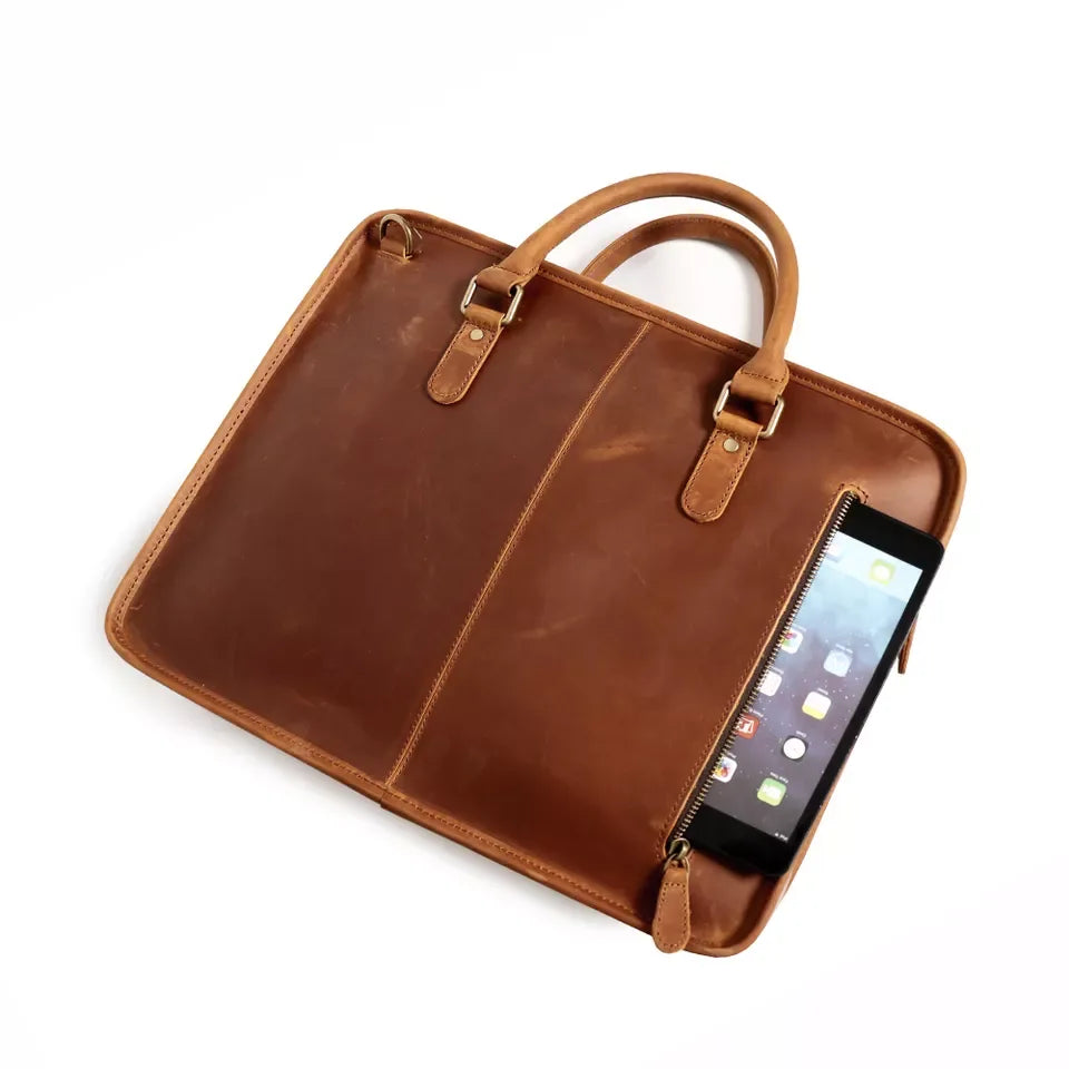Vintage leather briefcase with zip pocket and phone sleeve detail, brown leather