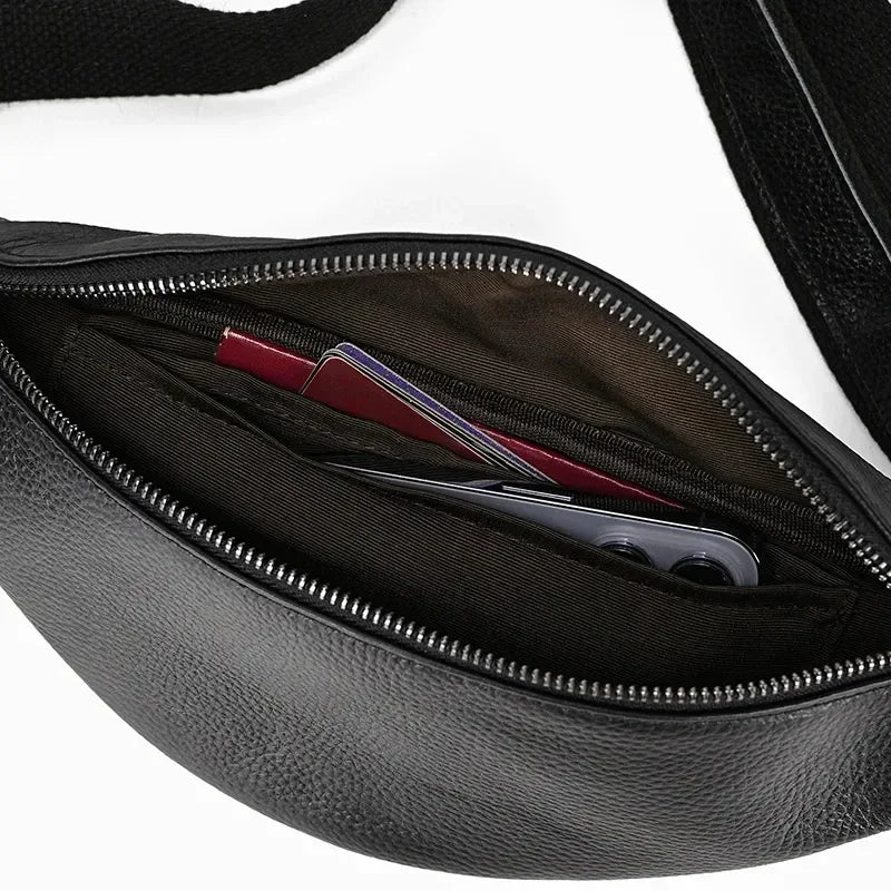 Black leather fanny pack interior with zipper pocket and card holder slots