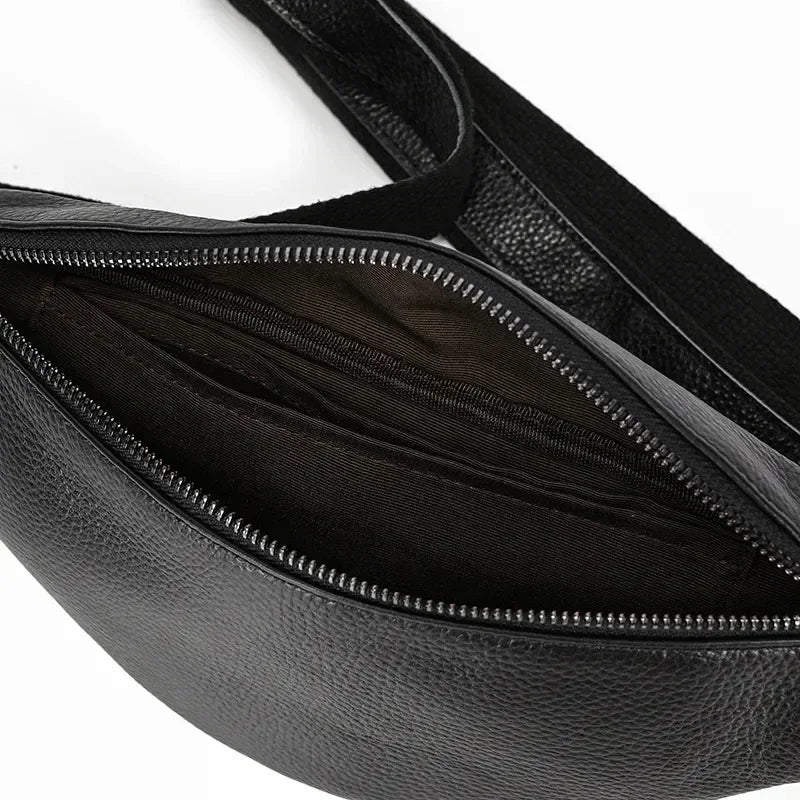 Black leather fanny pack interior with two zip compartments and card slots