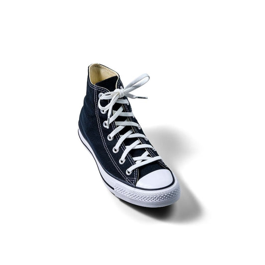Navy blue high-top sneaker with white laces on a white background