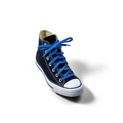 Black high-top sneaker with blue laces on a white background