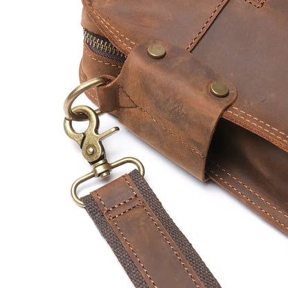 Brown leather strap attachment with brass snap button and key clip hardware