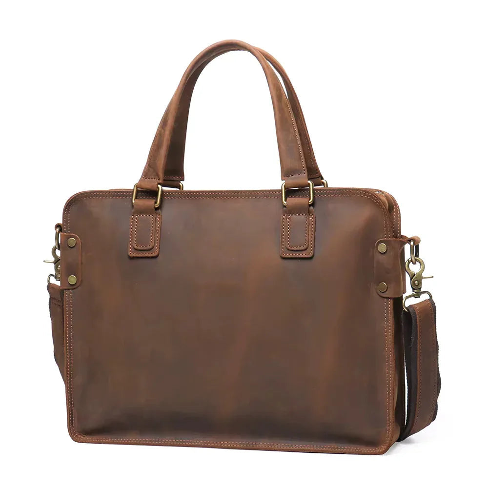 Brown genuine leather messenger bag with top handles and brass-tone hardware