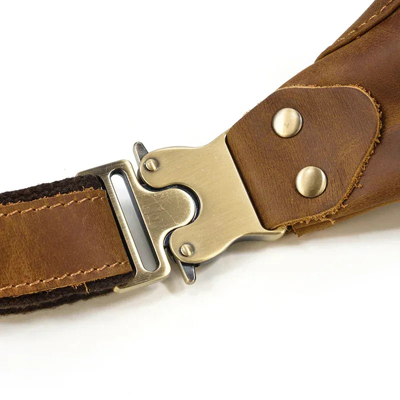 Brown leather waist belt with gold-tone metal buckle and riveted strap tab
