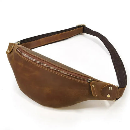 Brown leather fanny pack with front zip pocket and adjustable shoulder strap
