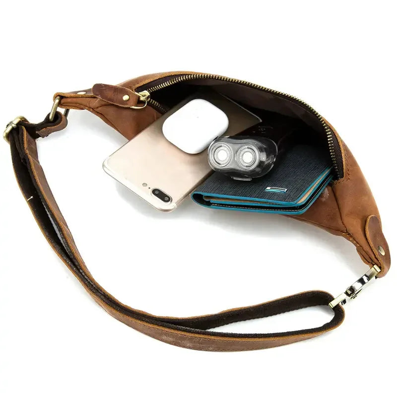 Brown leather fanny pack open to hold phone, cards, and small items