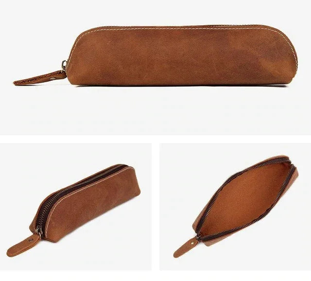 Brown leather makeup pouch with rounded shape, zipper closure and wrist strap