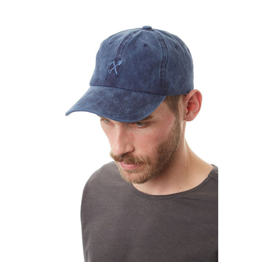 Man wearing a blue baseball cap on a white background