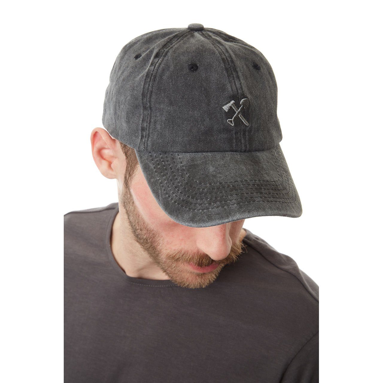 Man wearing a gray cap with a logo on a white background