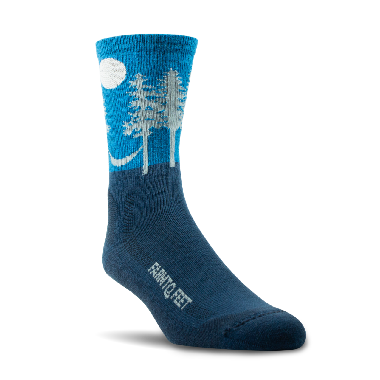 Blue sock with white tree and moon design on a white background