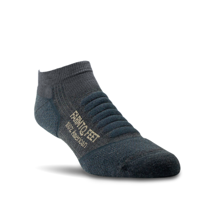 Dark gray ankle sock with brand logo on a white background