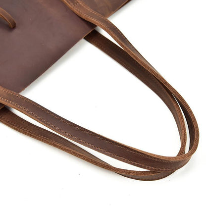 Leather tote bag with two long shoulder straps and contrast stitching detail