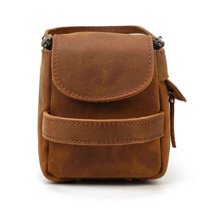 Small leather toiletry bag with front flap pocket and drawstring tassels