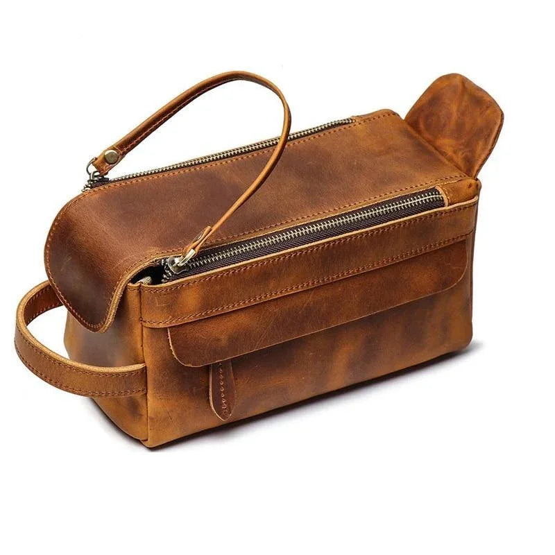 Handmade leather toiletry bag with top handle and double zip compartments