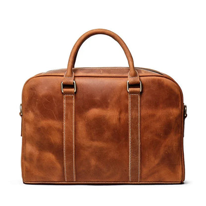 Vintage leather briefcase with top handles and curved side panels