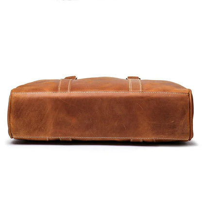 Vintage leather briefcase with top handles and full-width back panel stitching
