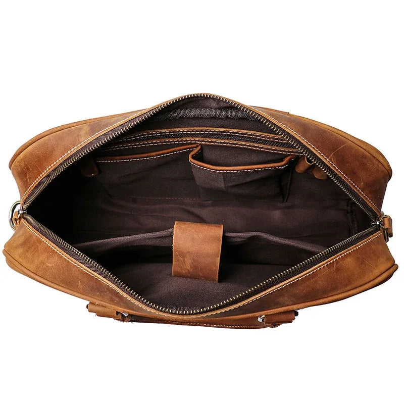 Vintage leather briefcase interior open showing zip lining and compartments