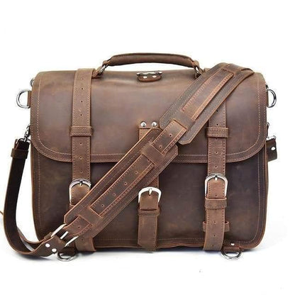 Dark brown vintage leather messenger bag with flap, buckles, and adjustable crossbody strap