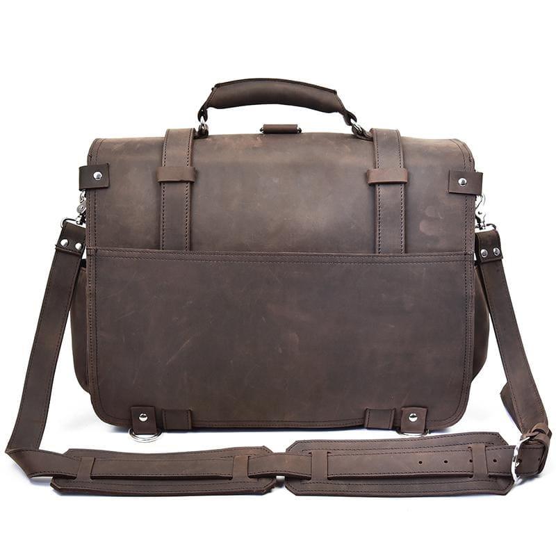 Dark brown leather messenger bag with front flap, buckled straps, and long crossbody strap