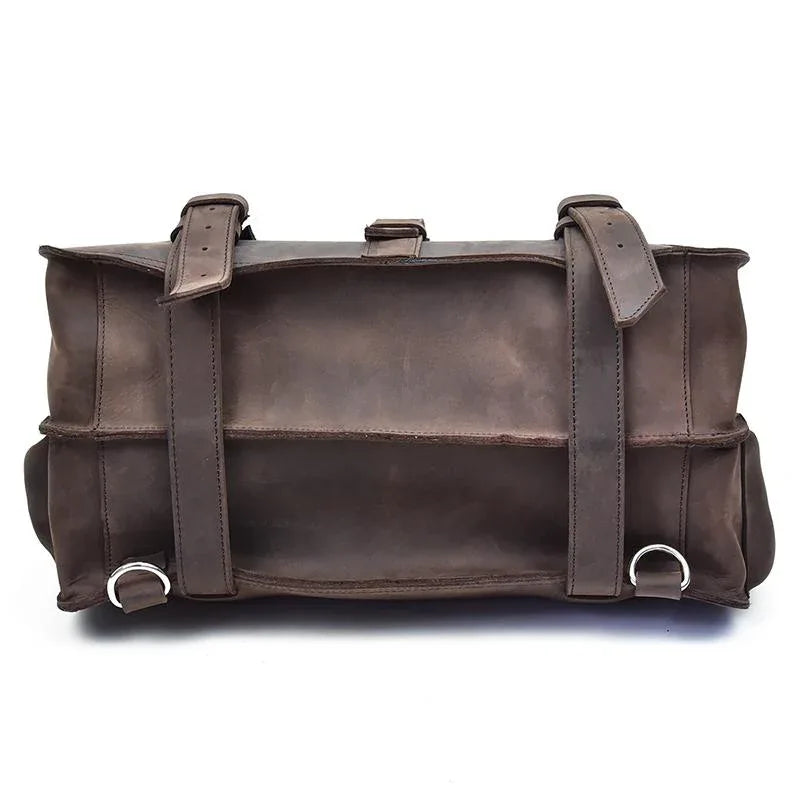 Dark brown leather messenger bag back with two vertical strap loops and top handle