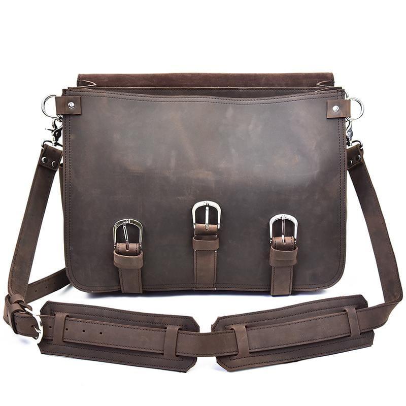 Dark brown leather messenger bag with flap and three front buckle straps, shoulder strap.