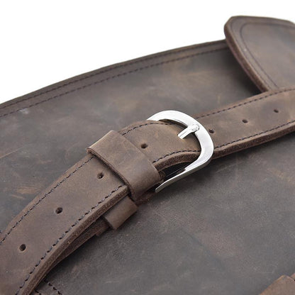 Dark brown leather messenger bag strap with adjustable buckle and metal loops