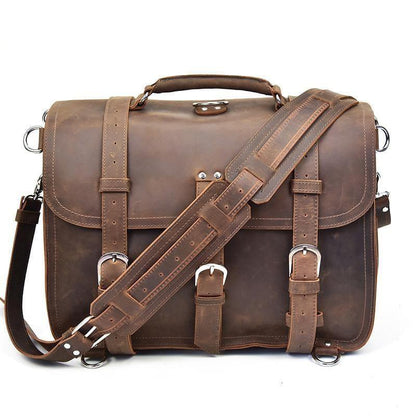 Dark brown leather messenger bag with crossbody strap and front buckle hardware