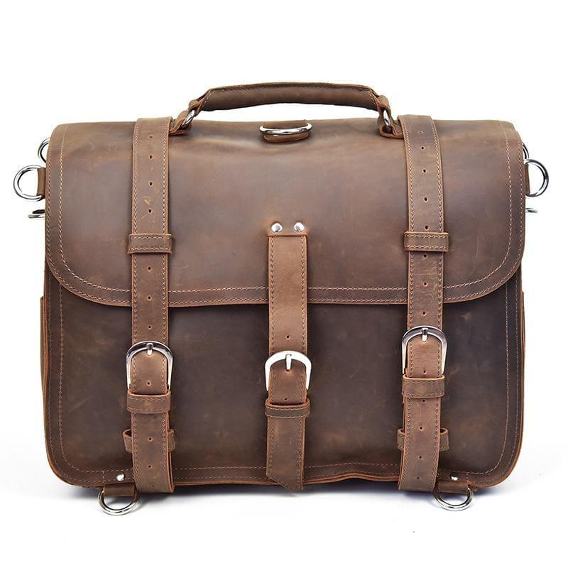 Brown leather messenger bag with flap, front organizer pocket, and adjustable straps.