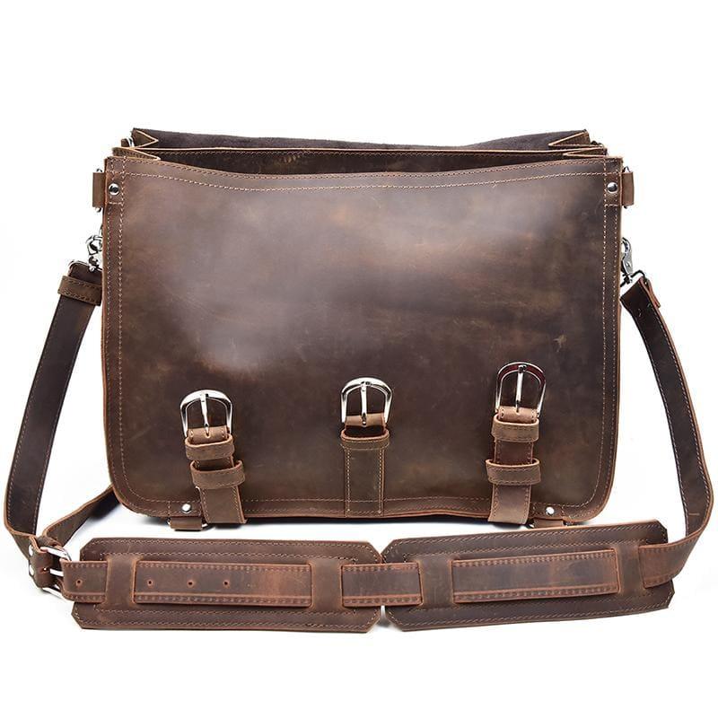 Dark brown leather messenger bag with flap, three front buckle loops, and shoulder strap