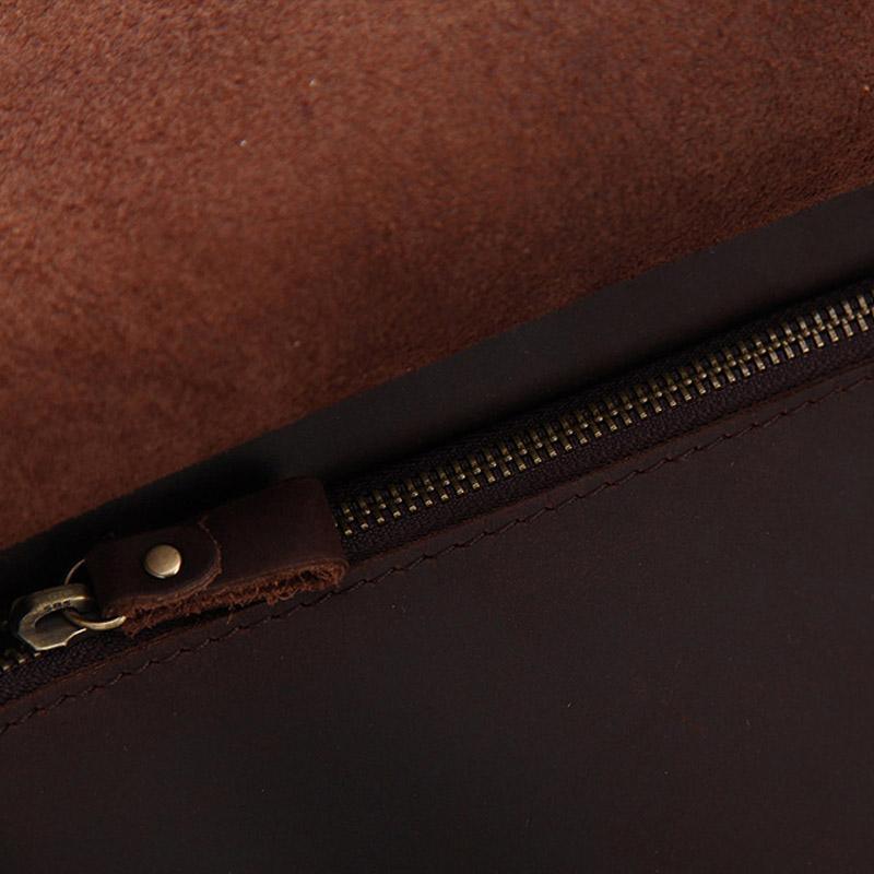 Close-up of interior zipper track and brown lining fabric