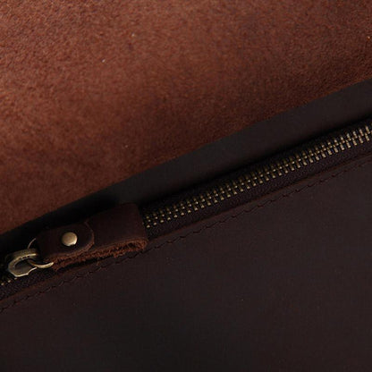 Close-up of interior zipper track and brown lining fabric