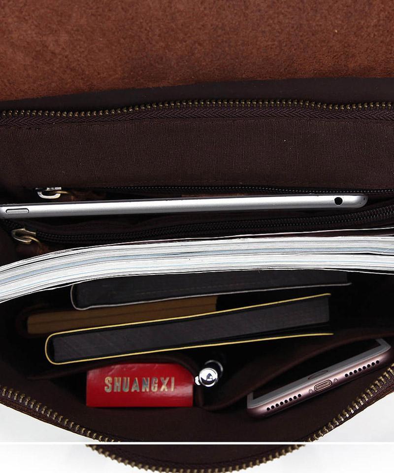 Open top zipper compartment with documents and pens, showing SHUANKXI label