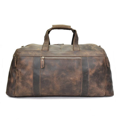 Distressed dark brown leather large duffle bag with top handles and front zipper detailing