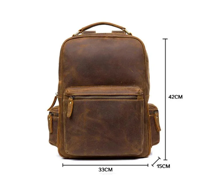 Brown leather backpack with top handle, front zip pocket, and side zip compartments.