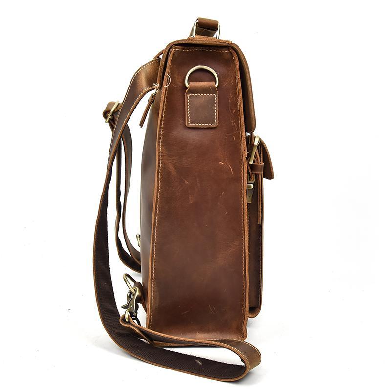 Brown leather shoulder backpack with crossbody strap and top carry handle