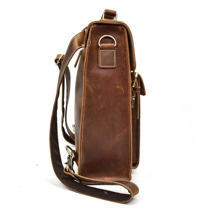 Brown leather shoulder backpack with crossbody strap and top carry handle