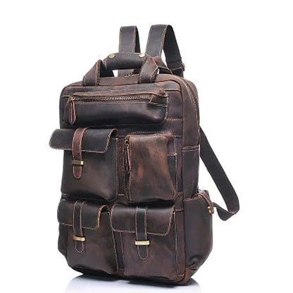 Brown leather backpack with side pockets and adjustable shoulder strap.