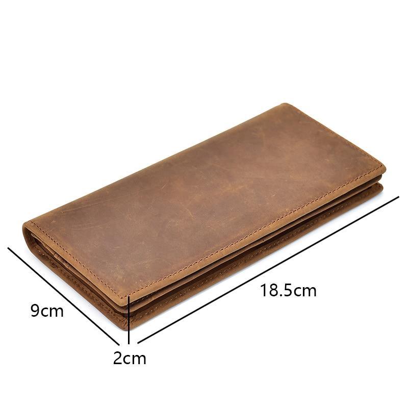 Brown leather pocket book with size shown: 18.5cm x 9cm x 2cm