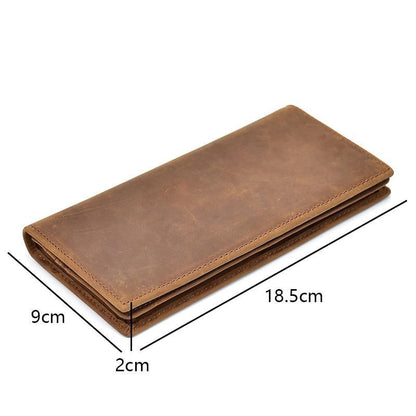 Brown leather pocket book with size shown: 18.5cm x 9cm x 2cm