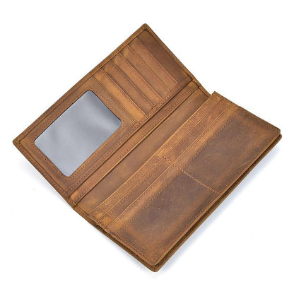 Brown leather pocket book opened to show card slots and clear ID window