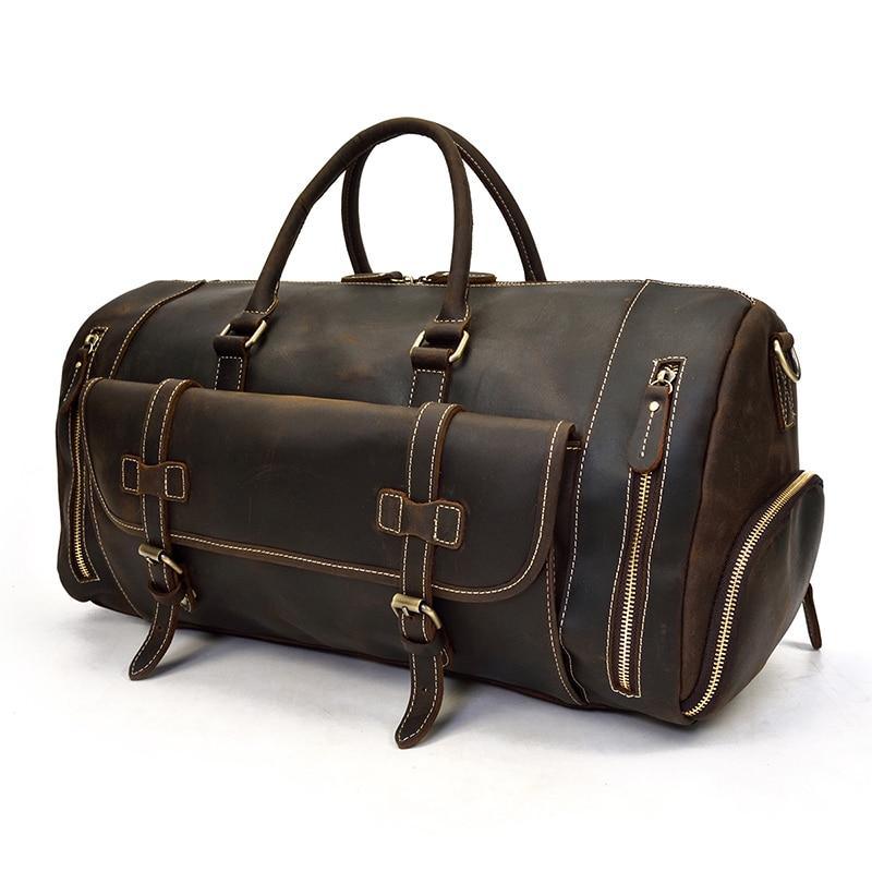 Handmade leather weekender duffle bag in dark brown with front buckled flap