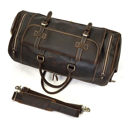Handmade leather duffle bag in dark brown with detachable long strap, dual side zips, buckles