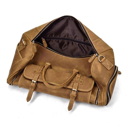 Handmade leather weekender duffle bag in dark brown with dual front straps and zipper